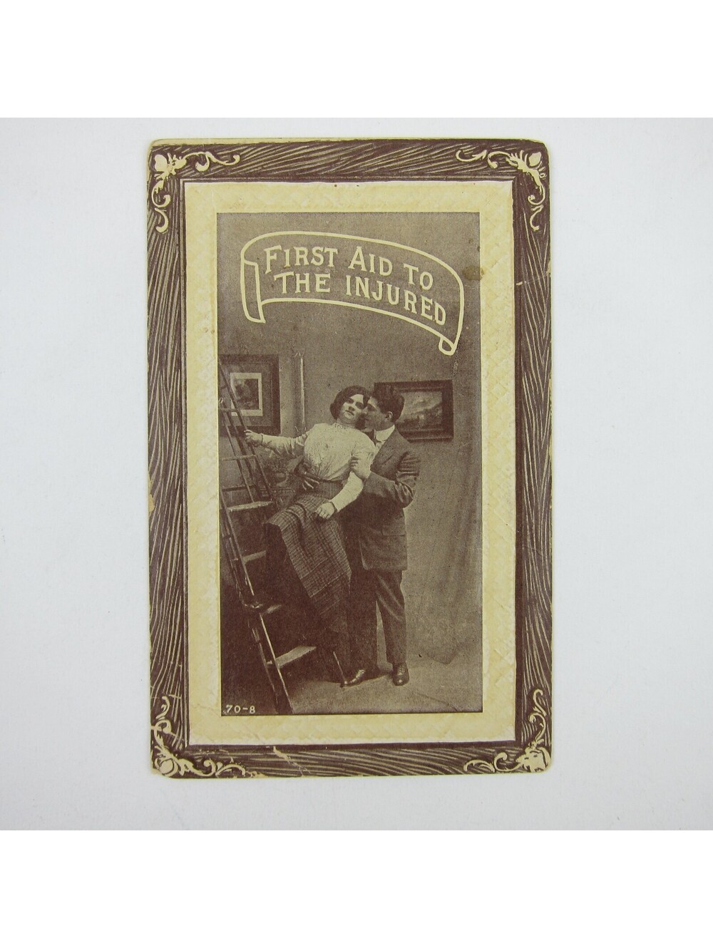 Postcard Risque Man & Woman Couple Romantic Lovers First Aid To Injured Antique